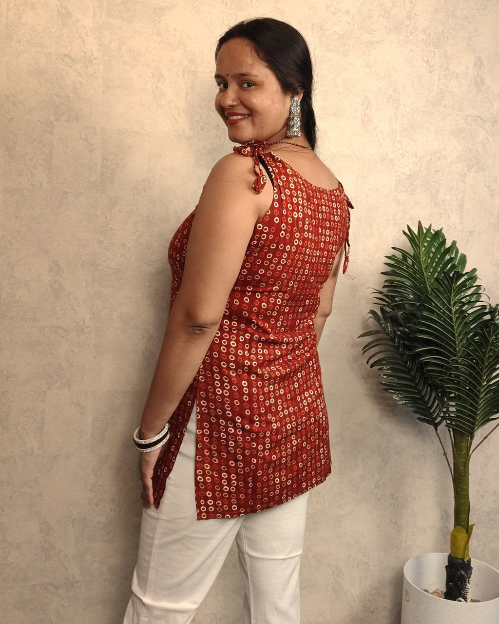 Rust Red Bandhani Ring Print Rayon Sleeveless Short Kurti