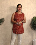 Rust Red Bandhani Ring Print Rayon Sleeveless Short Kurti